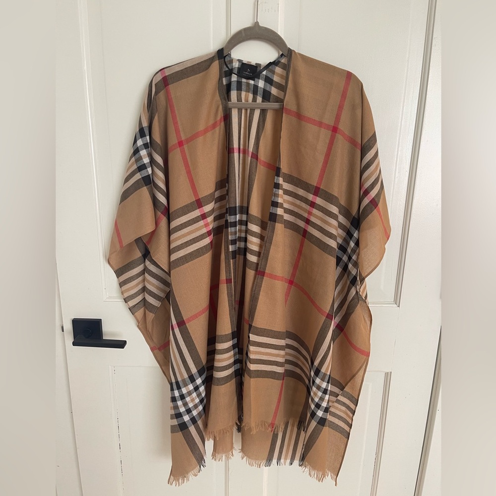 Lightweight plaid poncho.